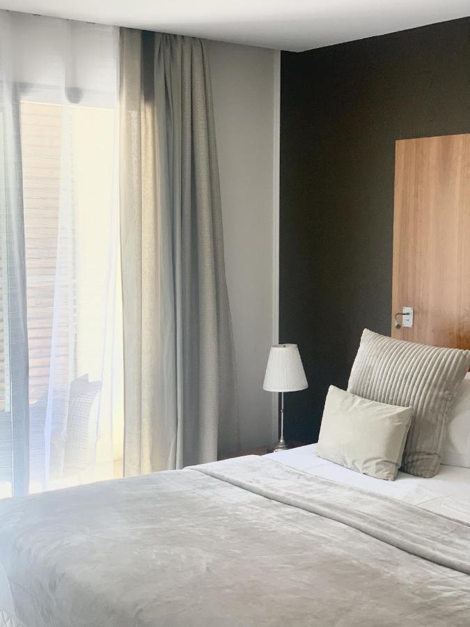 Hotel Au Bon Coin Du Lac มีมีซ็อง ภายนอก รูปภาพ