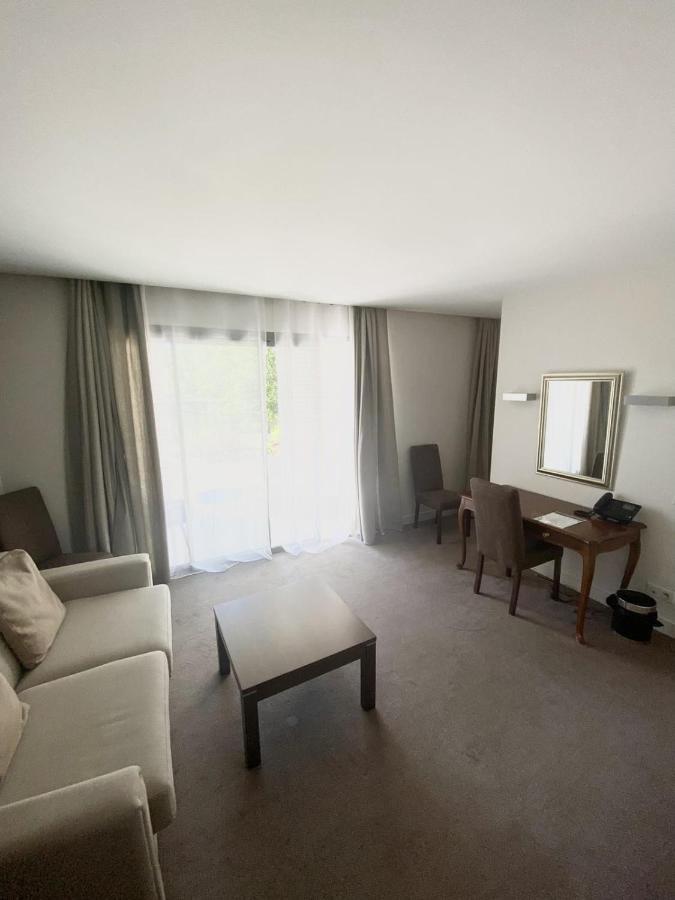 Hotel Au Bon Coin Du Lac มีมีซ็อง ภายนอก รูปภาพ